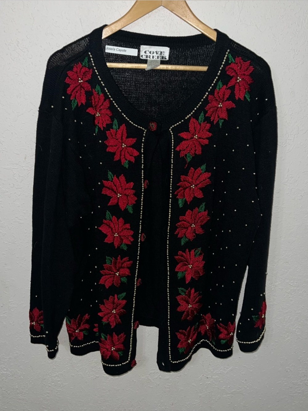 Cove Creek Black Poinsettia
Beaded Christmas Cardigan
Sweater Size 14/16.